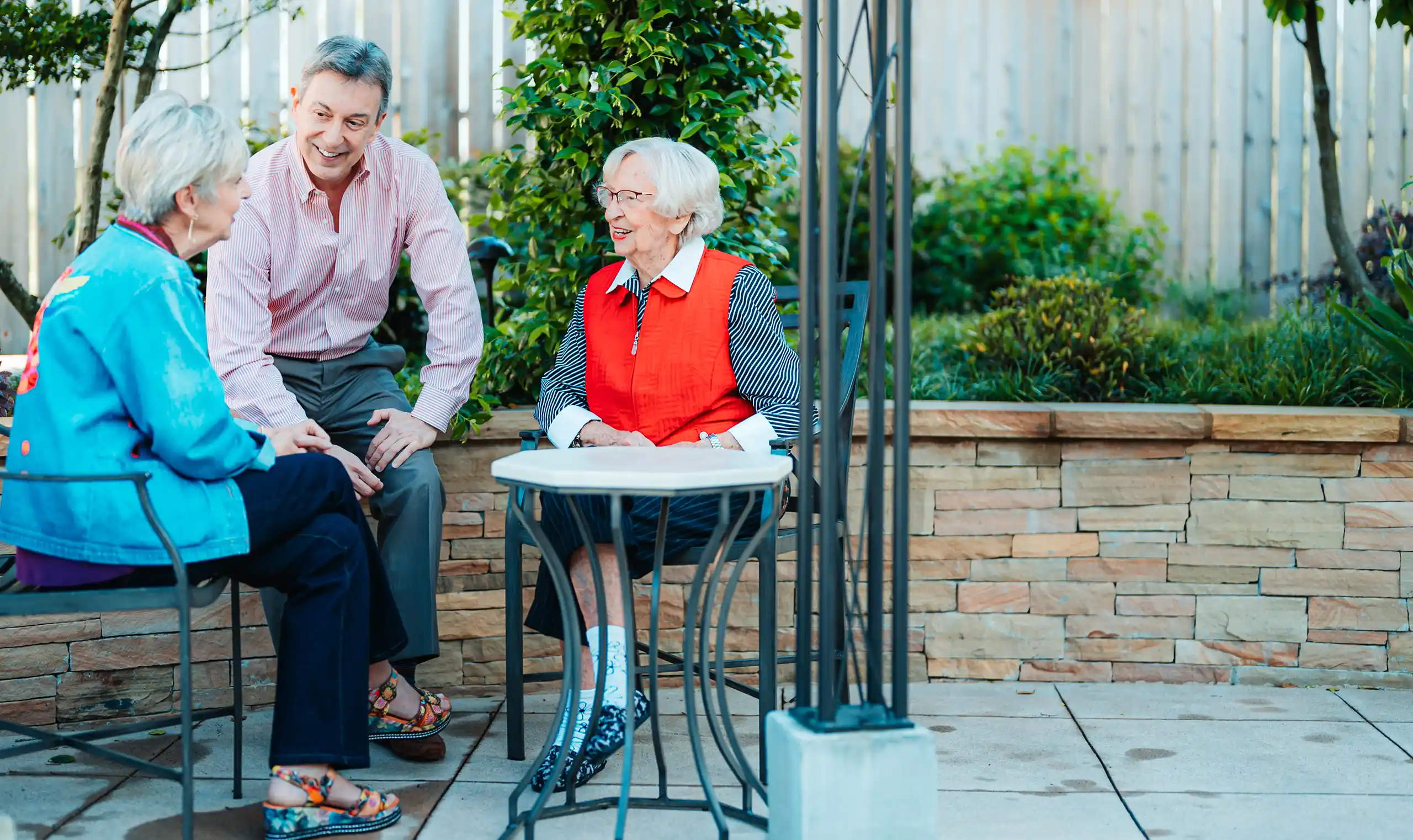 Retired friends having a conversation outside