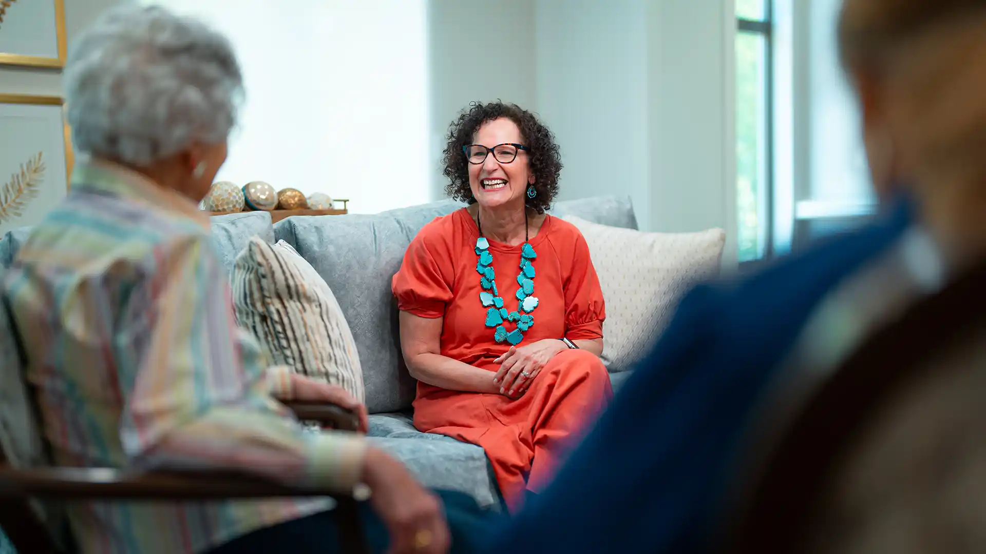 Canterbury residents enjoying time in the community lounge area