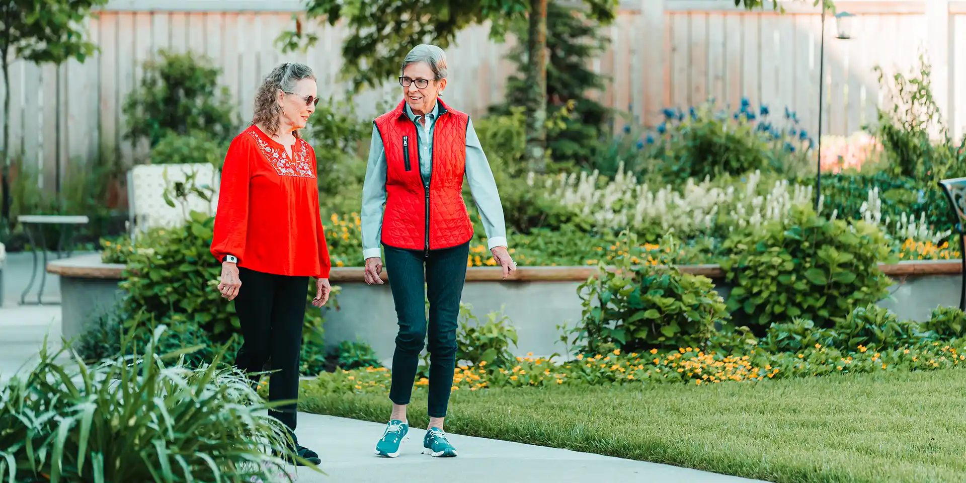 Canterbury Court residents walking around the Memory Support Garden.